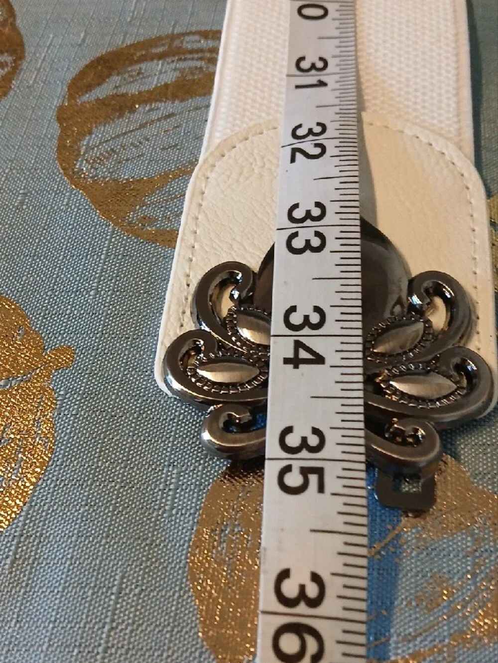 White Elastic Women's Belt with Decorative Silver Buckle. Never Worn.